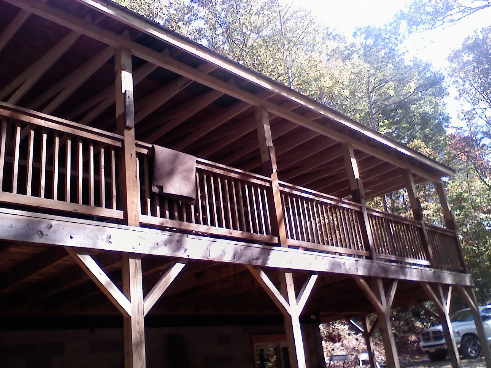 Timber framing under a new elevated porch and deck — Roof Leak Repair in Towson by Roofing Brothers